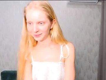 Tiny blonde teen porks her pussy with toys
